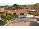 Charming home boasting modern landscaping, wrought iron gated entry, and a spacious driveway offering ample parking at 6975 Darby Ave, Las Vegas, NV 89117