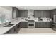 Modern kitchen featuring gray cabinetry, stainless steel appliances, and stylish white countertops at 6975 Darby Ave, Las Vegas, NV 89117