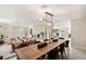 Spacious living room with modern design, a marble fireplace, and open floor plan at 6975 Darby Ave, Las Vegas, NV 89117