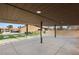 Covered patio with a spacious concrete area, providing ample space for outdoor activities and relaxation at 6975 Darby Ave, Las Vegas, NV 89117