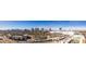 Panoramic aerial view showcasing the Las Vegas skyline and buildings in a vibrant neighborhood at 730 S Royal Crest Cir # 426, Las Vegas, NV 89169