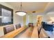 Well-lit dining area with a modern table and chairs at 730 S Royal Crest Cir # 426, Las Vegas, NV 89169