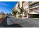 Exterior view of condo buildings, ground-level parking, landscaping, and stairs at 730 S Royal Crest Cir # 426, Las Vegas, NV 89169