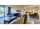 Bright living room with a fireplace, tile flooring, and access to a balcony at 730 S Royal Crest Cir # 426, Las Vegas, NV 89169