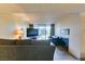 Inviting living room with neutral walls, sliding glass doors to the balcony, and tile floors at 730 S Royal Crest Cir # 426, Las Vegas, NV 89169