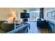 Comfortable living room with a sliding glass door, tile flooring and classic decor at 730 S Royal Crest Cir # 426, Las Vegas, NV 89169