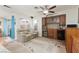 Comfortable living room with wood built-ins, wine refrigerator and lots of natural light at 7317 Bosky Springs St, Las Vegas, NV 89131