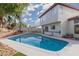 Inviting backyard pool with a spacious patio area, great for summer fun at 7317 Bosky Springs St, Las Vegas, NV 89131