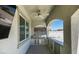 Covered outdoor kitchen with built-in grill, stainless steel appliances, counter space and ceiling fan at 792 Drammatico Pl, Henderson, NV 89011