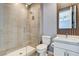 Modern bathroom with a glass-enclosed shower and stylish vanity offers a sleek and functional space at 795 Glistening Light Ct, Henderson, NV 89052