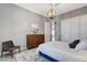 Bright bedroom features a large dresser, stylish lighting, and cozy textiles for a restful ambiance at 795 Glistening Light Ct, Henderson, NV 89052