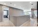 Upstairs hallway with views of the balcony and bedroom at 795 Glistening Light Ct, Henderson, NV 89052
