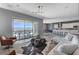 Open concept living room featuring mountain views, modern decor, and tile flooring at 795 Glistening Light Ct, Henderson, NV 89052