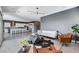 Open-concept living room showcases stylish furniture, a modern design and bright lighting at 795 Glistening Light Ct, Henderson, NV 89052