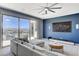 Comfortable upper-level living area with expansive mountain views and modern media setup at 795 Glistening Light Ct, Henderson, NV 89052