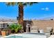 Inviting patio seating area with city views and a modern fire pit feature at 795 Glistening Light Ct, Henderson, NV 89052