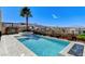 Inviting pool and spa with lush landscaping provide a tranquil retreat at 795 Glistening Light Ct, Henderson, NV 89052