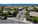 Aerial view of the community with tree lined streets and gated entrances at 8129 Jim Steele Falls St, North Las Vegas, NV 89085