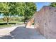 Community climbing wall with colorful holds and a sand-filled base for a safe and fun experience at 8129 Jim Steele Falls St, North Las Vegas, NV 89085