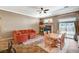 Cozy living room and dining area with fireplace and sliding glass door to the yard at 8129 Jim Steele Falls St, North Las Vegas, NV 89085