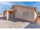 Backyard with a covered patio offering an inviting space for outdoor living and entertaining at 1036 Kennebunk Cir, Henderson, NV 89015