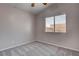Neutral bedroom featuring gray carpet, a window, and neutral walls at 1036 Kennebunk Cir, Henderson, NV 89015