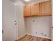 Functional laundry room featuring cabinets for storage at 1036 Kennebunk Cir, Henderson, NV 89015