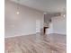 Large, open living area with wood floors and neutral walls and lighting at 1036 Kennebunk Cir, Henderson, NV 89015