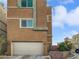 Modern two-story home featuring an attached garage and neutral stucco exterior at 10537 Headwind Ave, Las Vegas, NV 89129