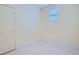 Bedroom with neutral tile floors and a window at 10580 Riva Grande Ct, Las Vegas, NV 89135