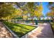 Bocce ball court surrounded by trees and seating, creating a relaxing recreational space at 10580 Riva Grande Ct, Las Vegas, NV 89135