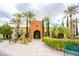 Exterior shot of clubhouse entrance, showcasing its manicured landscaping and inviting facade at 10580 Riva Grande Ct, Las Vegas, NV 89135