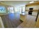 Bright open floor plan with dining area and a kitchen featuring stainless steel appliances at 10580 Riva Grande Ct, Las Vegas, NV 89135