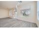 Bright living area featuring sleek floors, ample natural light, and seamless access to the outdoor patio at 10580 Riva Grande Ct, Las Vegas, NV 89135