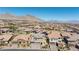 Primary-planned community with various single-Gathering homes against mountain backdrop at 11834 Albissola Ave, Las Vegas, NV 89138