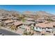 Planned community features single Gathering homes against a backdrop of mountains at 11834 Albissola Ave, Las Vegas, NV 89138
