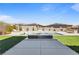 Beautiful pool, lush artificial grass and lounge chairs create a tranquil setting at 11834 Albissola Ave, Las Vegas, NV 89138