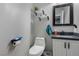 Well-lit half bathroom with vanity, modern fixtures, and stylish decor at 140 Rolling Cove Ave, Henderson, NV 89011