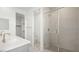 Modern bathroom featuring double vanity, walk-in shower, and separate water closet at 1452 Melodic Lark Ln, Las Vegas, NV 89138