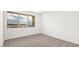 Light-filled bedroom with views of the surrounding neighborhood at 1452 Melodic Lark Ln, Las Vegas, NV 89138