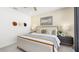Well-lit bedroom with neutral walls, stylish decor, and a comfortable queen-sized bed at 1452 Melodic Lark Ln, Las Vegas, NV 89138