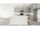 Kitchen with center island featuring white countertops and gray cabinetry at 1452 Melodic Lark Ln, Las Vegas, NV 89138