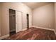 Bedroom with open closet spaces and hardwood floors at 150 N Las Vegas Blvd # 804, Las Vegas, NV 89101