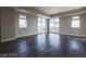 Spacious living room with large windows offering city views, lots of light, and hardwood floors at 150 N Las Vegas Blvd # 804, Las Vegas, NV 89101