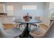 Modern dining area featuring contemporary furnishings and ample natural light at 1608 Rock Ridge Pl, North Las Vegas, NV 89084