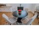 Dining area boasts elegant table, decor, and seamless access to kitchen at 1608 Rock Ridge Pl, North Las Vegas, NV 89084