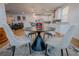 Stylish dining area seamlessly connects to a modern kitchen, perfect for entertaining at 1608 Rock Ridge Pl, North Las Vegas, NV 89084