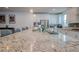 Spacious kitchen featuring a large island with granite countertops and modern appliances at 1608 Rock Ridge Pl, North Las Vegas, NV 89084