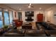 Comfortable living room with stylish furnishings and a modern entertainment center at 1608 Rock Ridge Pl, North Las Vegas, NV 89084