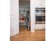 Walk-in pantry with ample shelving, providing practical storage and easy organization of household goods at 1608 Rock Ridge Pl, North Las Vegas, NV 89084